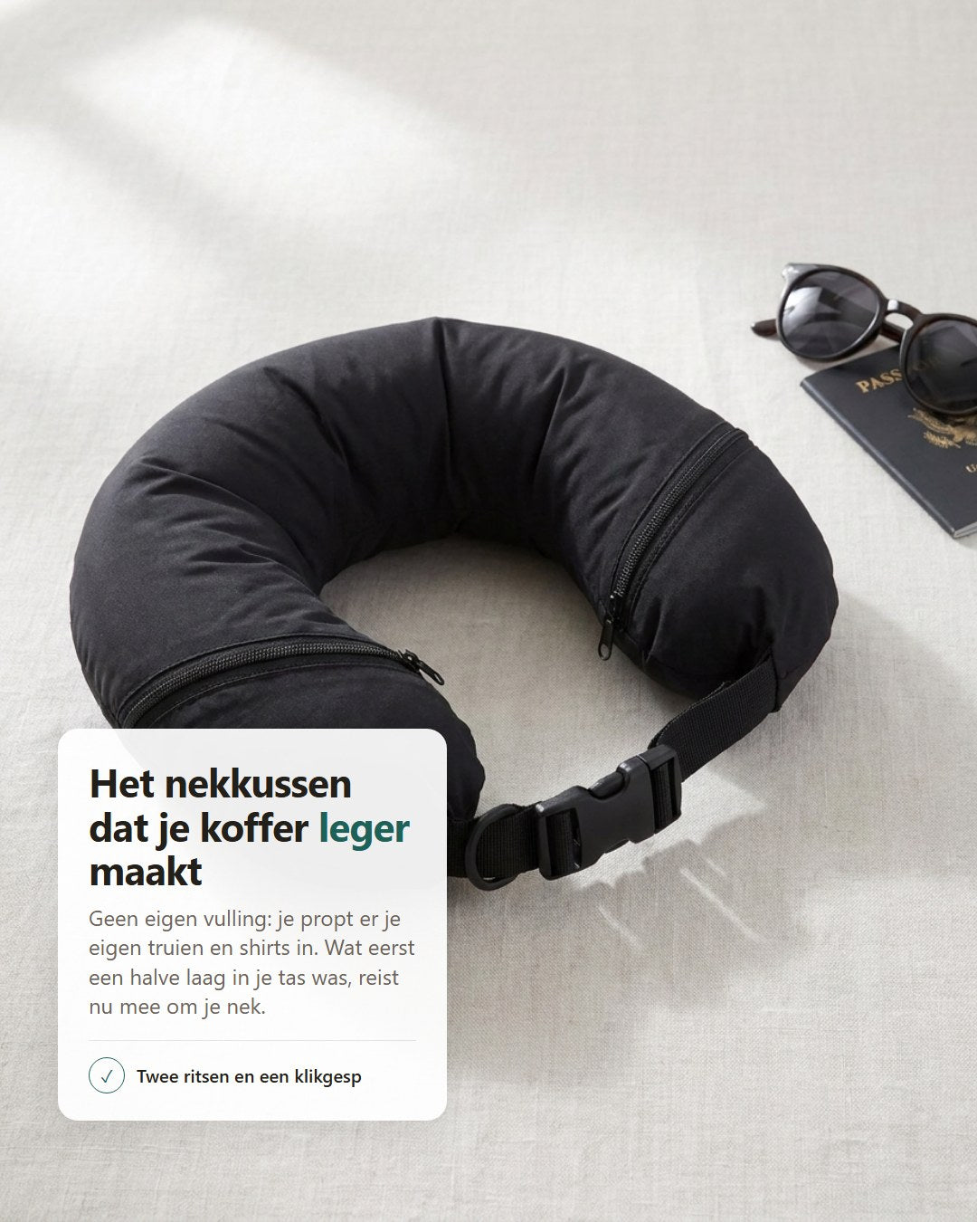 Zwart reisnekkussen met twee ritsen en klikgesp